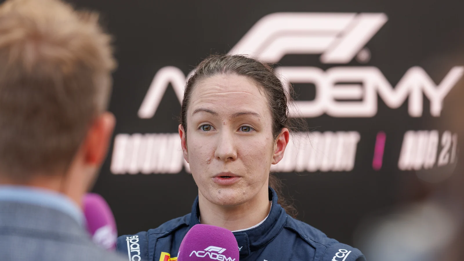 Alisha Palmowski in her Red Bull race suit during an interview at Zandvoort in 2026