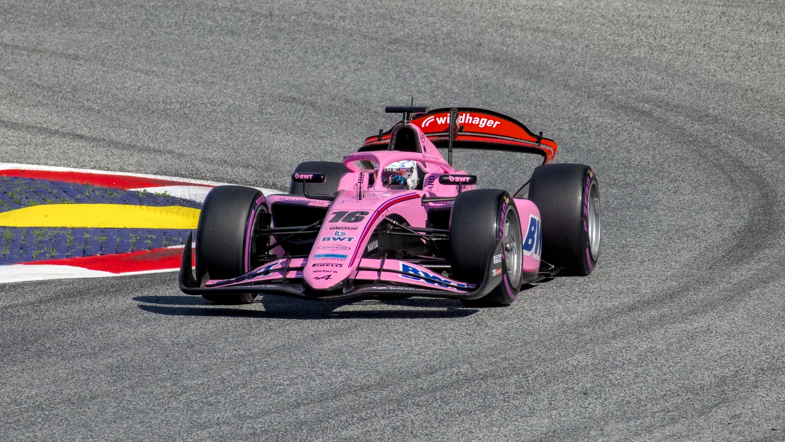 Kush Maini’s ART Grand Prix car crossing the kerb at Spielberg.