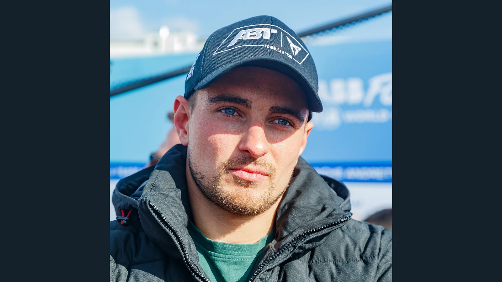 Archive portrait of Nico Müller at the 2023 Berlin E-Prix wearing an ABT Cupra cap